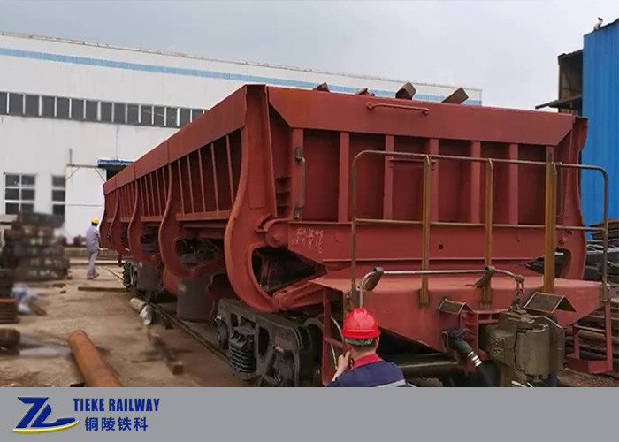 50km/h ব্যালাস্ট স্টিল স্ল্যাগ সাইড ডাম্প কার ওয়াগন 1435 মিমি গেজ দ্রুত টিপিং আনলোডিং